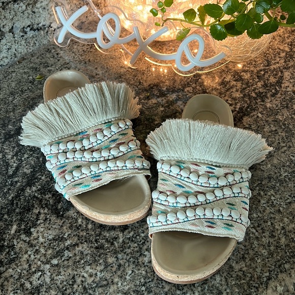 Chloe Shoes - Chloe’ Fringe Nolan Slides